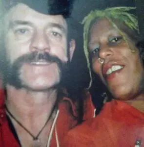 Two people smiling in close-up selfie